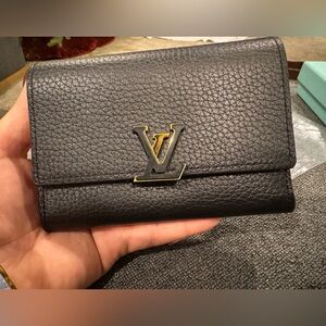 Authentic Louis Vuitton Taruillon Capucines leather trifold wallet
